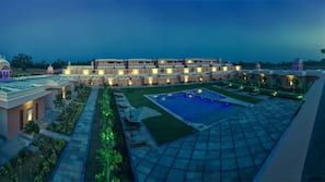 Indoor pool, outdoor pool, free pool cabanas, pool umbrellas