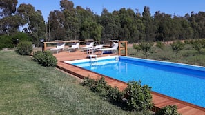 Indoor pool, seasonal outdoor pool, pool umbrellas, sun loungers