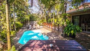 Outdoor pool, pool umbrellas, pool loungers