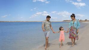 Private beach, white sand, sun-loungers, beach umbrellas