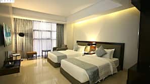 Premium bedding, pillow top beds, minibar, in-room safe