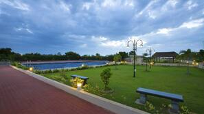 Outdoor pool, a natural pool, open 8:00 AM to 6:00 PM, pool umbrellas