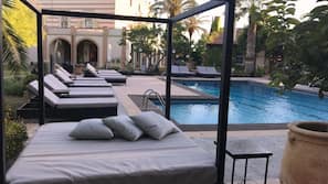 Outdoor pool, pool umbrellas, pool loungers