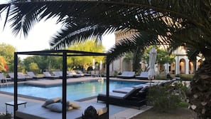 Outdoor pool, pool umbrellas, pool loungers