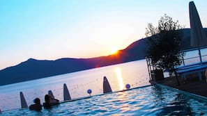 Outdoor pool, pool umbrellas, pool loungers