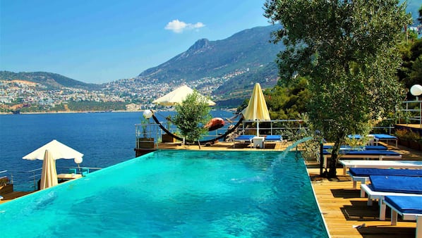 Outdoor pool, pool umbrellas, pool loungers