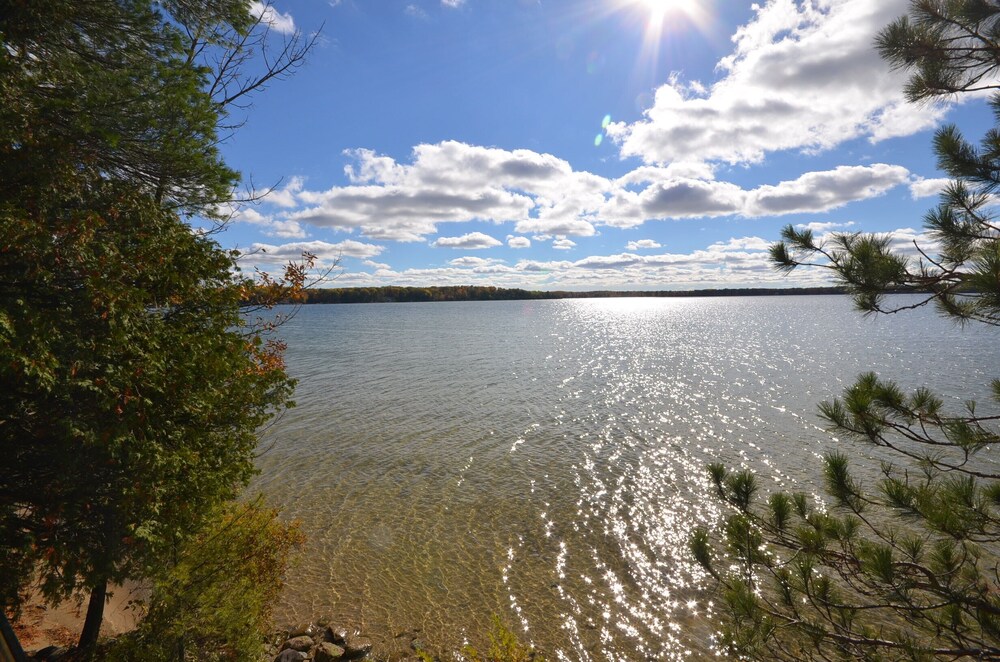 Modern home on all sports Long Lake in Traverse City. Dock. Pet ok.