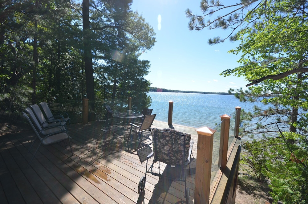 Modern home on all sports Long Lake in Traverse City. Dock. Pet ok.