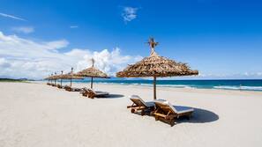 Private beach, beach umbrellas, beach towels, beach yoga