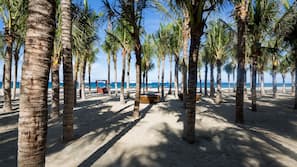 Private beach, beach umbrellas, beach towels, beach yoga