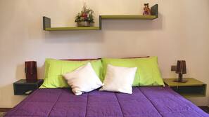 Ropa de cama de alta calidad, minibar, caja fuerte y escritorio