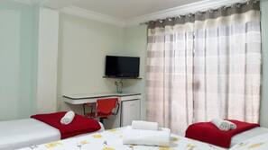 Roupas de cama premium, frigobar, cortinas blackout