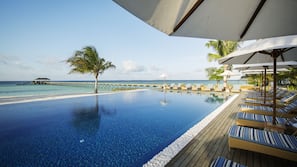 Outdoor pool, pool umbrellas, pool loungers