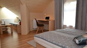 In-room safe, blackout curtains, iron/ironing board, cots/infant beds