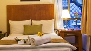 Edredones de plumas, colchones Select Comfort, minibar y caja fuerte