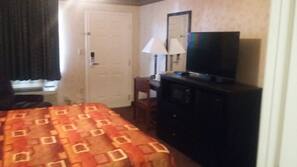 Desk, blackout drapes, iron/ironing board, rollaway beds