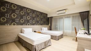 Desk, blackout drapes, rollaway beds, free WiFi