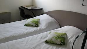 Desk, blackout curtains, free WiFi, linens