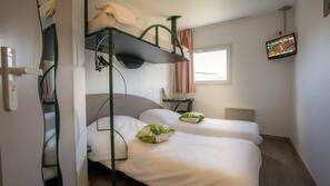 Desk, blackout curtains, free WiFi, linens