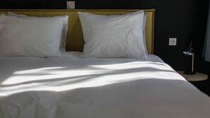 Premium bedding, down comforters, blackout drapes, free WiFi