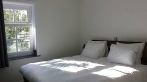 Premium bedding, down comforters, blackout drapes, free WiFi