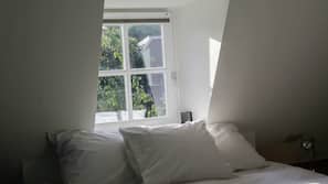 Premium bedding, down comforters, blackout drapes, free WiFi