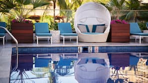 Outdoor pool, open 7:00 AM to 9:00 PM, free pool cabanas, pool loungers