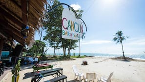On the beach, sun-loungers, beach umbrellas, snorkelling