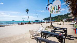 On the beach, sun-loungers, beach umbrellas, snorkelling