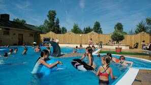 Seasonal outdoor pool, open 8 AM to 6 PM, pool loungers