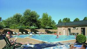 Seasonal outdoor pool, open 8 AM to 6 PM, pool loungers