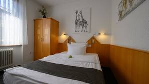 Hochwertige Bettwaren, Daunenbettdecken, Minibar, Zimmersafe