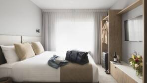 Desk, laptop workspace, blackout curtains, iron/ironing board