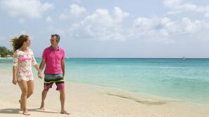 Beach nearby, white sand, beach towels