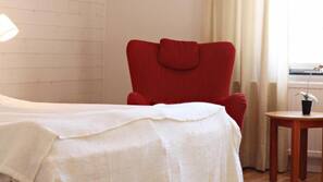 Luxe beddengoed, een bureau, verduisterende gordijnen