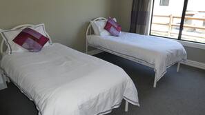 4 bedrooms, premium bedding, iron/ironing board