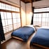 Taketa station hostel cue