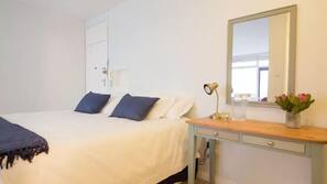 Iron/ironing board, cots/infant beds, linens