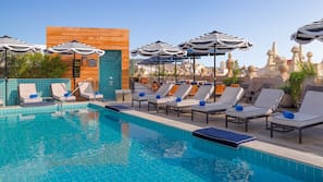 Outdoor pool, sun loungers