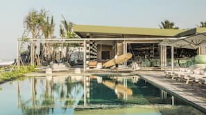 2 outdoor pools, pool umbrellas, pool loungers