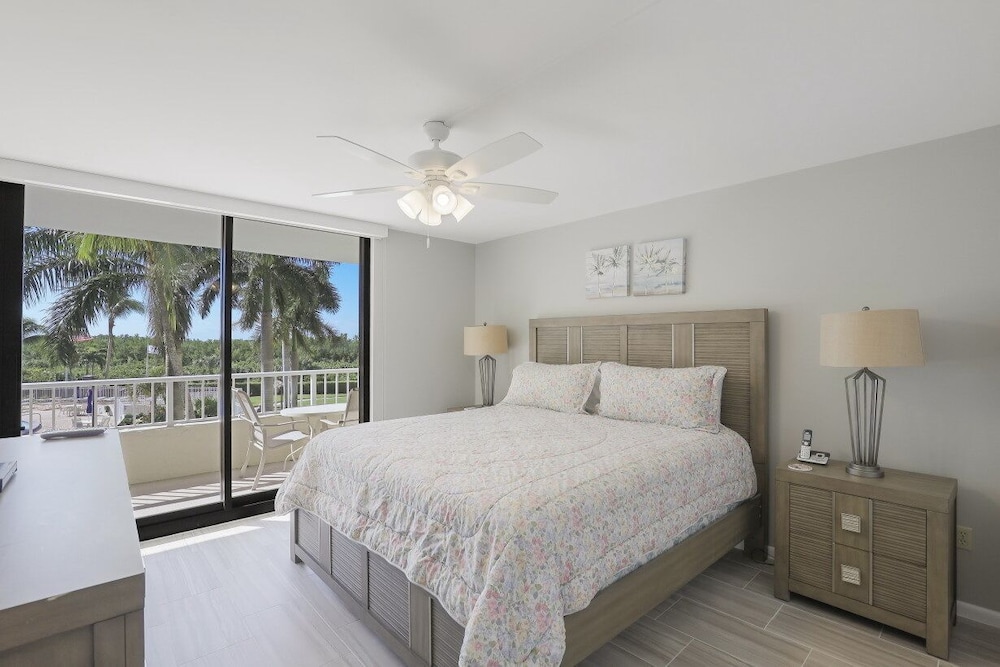 Ideally situated beachfront condo w/ heated pool & two separate