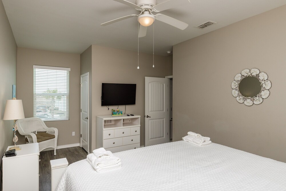 Unit w/ Coastal Interior, Playground, Heated Pool + Washer