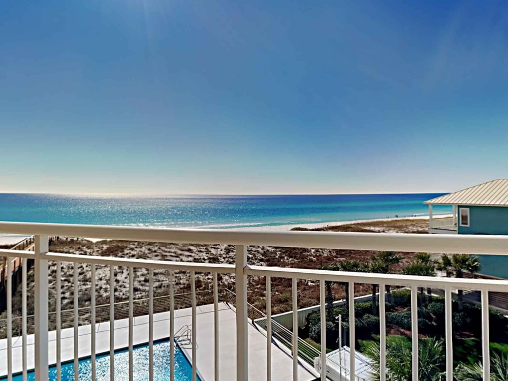 Beachfront Condo with Resort Style Amenities, Private Balcony Overlooking Sand