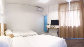 Desk, blackout curtains, free WiFi, linens