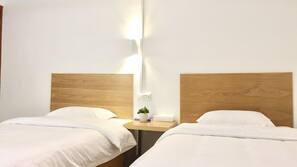 Desk, blackout curtains, free WiFi, linens