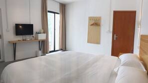 Desk, blackout curtains, free WiFi, linens