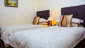 Premium bedding, iron/ironing board, free cribs/infant beds, free WiFi