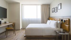 Down comforters, pillowtop beds, in-room safe, desk