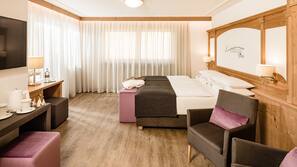Down comforters, memory foam beds, minibar, in-room safe