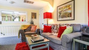 Flat-screen TV, DVD player, video library, stereo